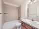 Small bathroom with shower/tub combo and wood vanity at 646 N 13Th Ave, Brighton, CO 80601