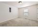 Simple bedroom with carpet, window, and wall art at 646 N 13Th Ave, Brighton, CO 80601