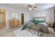 Primary bedroom with a stylish dresser and comfortable bed at 646 N 13Th Ave, Brighton, CO 80601