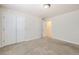 Bedroom with double doors leading to closet and hallway at 646 N 13Th Ave, Brighton, CO 80601