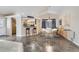 Bright dining area with wood floors and a modern chandelier at 646 N 13Th Ave, Brighton, CO 80601