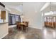 Bright dining room with tile floor and adjacent kitchen at 646 N 13Th Ave, Brighton, CO 80601