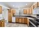 Well-equipped kitchen offering a dishwasher and gas range at 646 N 13Th Ave, Brighton, CO 80601