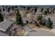 Charming single-story home with mature trees and a well-manicured lawn in a quiet neighborhood at 7690 S Uinta Ct, Centennial, CO 80112