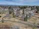 A home backs to a greenbelt, offering a serene setting with mature trees and a walking path at 7690 S Uinta Ct, Centennial, CO 80112