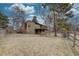 Expansive backyard features a charming balcony and a well-maintained fence line, ideal for outdoor enjoyment at 7690 S Uinta Ct, Centennial, CO 80112