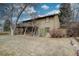 Expansive backyard features a charming balcony and a well-maintained fence line, ideal for outdoor enjoyment at 7690 S Uinta Ct, Centennial, CO 80112