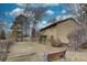 Expansive backyard features a charming balcony and a well-maintained fence line, ideal for outdoor enjoyment at 7690 S Uinta Ct, Centennial, CO 80112