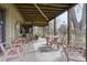 Spacious covered patio with ample seating and outdoor dining area, perfect for entertaining and enjoying fresh air at 7690 S Uinta Ct, Centennial, CO 80112