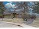 Charming single-Gathering home featuring a two-car garage and lush landscaping, perfect for suburban living at 7690 S Uinta Ct, Centennial, CO 80112