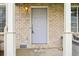 Inviting townhouse entrance featuring a classic front door and well-maintained landscaping at 1259 W 112Th Ave # B, Denver, CO 80234