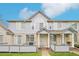Charming townhouse with a brick and siding exterior, complemented by a well-maintained front lawn at 1259 W 112Th Ave # B, Denver, CO 80234