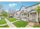 Townhouse exteriors feature well-manicured lawns and ample street parking for residents and guests at 1259 W 112Th Ave # B, Denver, CO 80234