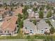 Aerial perspective showing home in established neighborhood with mature landscaping and outdoor decks at 7400 W Grant Ranch Blvd # 5, Littleton, CO 80123