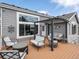 Relax on this deck with outdoor seating and enjoy privacy and shade under the modern pergola at 7400 W Grant Ranch Blvd # 5, Littleton, CO 80123