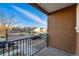 Balcony view of quiet street with neighborhood houses and car parking at 4705 Andes St, Denver, CO 80249