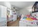 Bright bedroom with lots of storage space and a white closet at 4705 Andes St, Denver, CO 80249