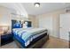Comfortable bedroom with a large bed and ample closet space at 4705 Andes St, Denver, CO 80249