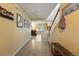 Welcoming entryway with stylish decor, staircase, and a glimpse into the spacious living area at 4705 Andes St, Denver, CO 80249