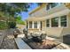 Spacious backyard patio with outdoor seating and a grill, ideal for outdoor gatherings and relaxation at 10832 Montvale Cir, Highlands Ranch, CO 80130