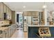 Well-equipped kitchen with stainless steel appliances, granite countertops, and ample cabinet space at 10832 Montvale Cir, Highlands Ranch, CO 80130