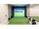 Finished basement with golf simulator at 1382 Raindrop Way, Castle Rock, CO 80109