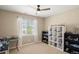 Comfortable bedroom with large window providing natural light at 1382 Raindrop Way, Castle Rock, CO 80109