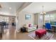 Inviting office with ample natural light, a comfortable seating area, and desk at 1382 Raindrop Way, Castle Rock, CO 80109