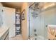 Modern bathroom featuring a glass shower and built-in storage units for towels and essentials at 960 N Sherman St # 3F, Denver, CO 80203
