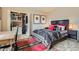 Comfortable bedroom with a closet, soft lighting, and stylish decor at 960 N Sherman St # 3F, Denver, CO 80203