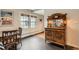 Cozy dining area with natural light and a vintage hutch at 960 N Sherman St # 3F, Denver, CO 80203