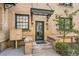 Close up of an entryway door with a secure mailbox and a classic covered porch at 960 N Sherman St # 3F, Denver, CO 80203