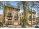 Charming brick apartments with a garage and traditional architectural details including black iron balconies at 960 N Sherman St # 3F, Denver, CO 80203