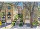 Attractive exterior elevation showcasing brick facade, balconies, and well-maintained landscaping at 960 N Sherman St # 3F, Denver, CO 80203