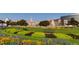 Exterior view showcasing building with beautiful lawn and flower garden and city landmark at 960 N Sherman St # 3F, Denver, CO 80203