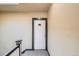 Hallway featuring unit entrance with stylish patterned carpeting and neutral colored walls and trim at 960 N Sherman St # 3F, Denver, CO 80203