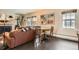 Cozy living room with a fireplace, comfortable seating, and stylish decor at 960 N Sherman St # 3F, Denver, CO 80203