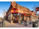 A bright corner restaurant with glass windows and door with a small patio area in front at 960 N Sherman St # 3F, Denver, CO 80203