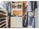 Organized walk-in closet with shelving, drawers, and hanging space for clothes and accessories at 960 N Sherman St # 3F, Denver, CO 80203