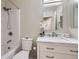 Modern bathroom with marble countertop vanity and shower with new fixture at 2556 E 131St Pl, Thornton, CO 80241
