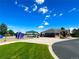 Community clubhouse and fenced playground, picnic area and seating at 2556 E 131St Pl, Thornton, CO 80241