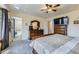 Comfortable main bedroom with an ensuite bathroom and walk-in closet at 2556 E 131St Pl, Thornton, CO 80241