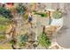An aerial shot of a property with a spacious backyard, mature trees, and a well-maintained roof at 5050 W 102Nd Ave, Westminster, CO 80031