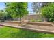 Backyard showing a fenced garden bed, beautiful landscaping, and lovely greenery, perfect for outdoor enjoyment at 5050 W 102Nd Ave, Westminster, CO 80031