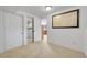 Spacious basement area with carpet flooring leads to additional rooms with ample closet space at 5050 W 102Nd Ave, Westminster, CO 80031