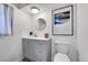 Stylish bathroom with vanity, modern fixtures, decorative mirror, and unique Ansel Adams wall art at 5050 W 102Nd Ave, Westminster, CO 80031