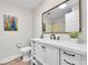 Bathroom featuring large vanity, framed mirror and tiled shower at 5050 W 102Nd Ave, Westminster, CO 80031
