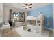 bedroom with unique bunk beds, neutral walls, and ceiling fan at 5050 W 102Nd Ave, Westminster, CO 80031