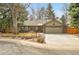 Inviting home with a two-car garage, well-maintained front yard and mature trees, enhancing curb appeal at 5050 W 102Nd Ave, Westminster, CO 80031