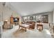 Bright living room featuring a large window and comfortable seating at 5050 W 102Nd Ave, Westminster, CO 80031
